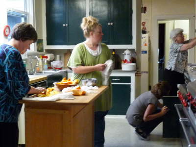 Parents helping in the kitchen